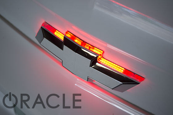 Close-up of Illuminated LED Rear Bowtie Emblem installed on a Chevrolet Camaro.