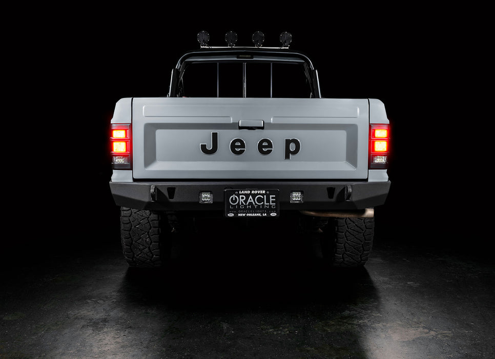 Rear view of Jeep Comanche with flush mount tail lights and brake lights on