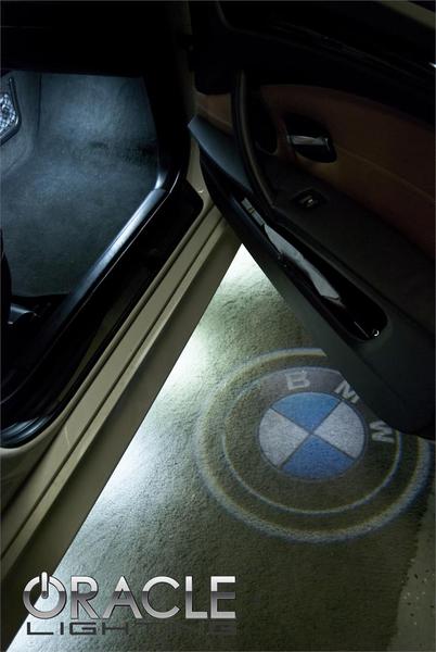 GOBO Projector installed on a car door, showing the BMW logo.
