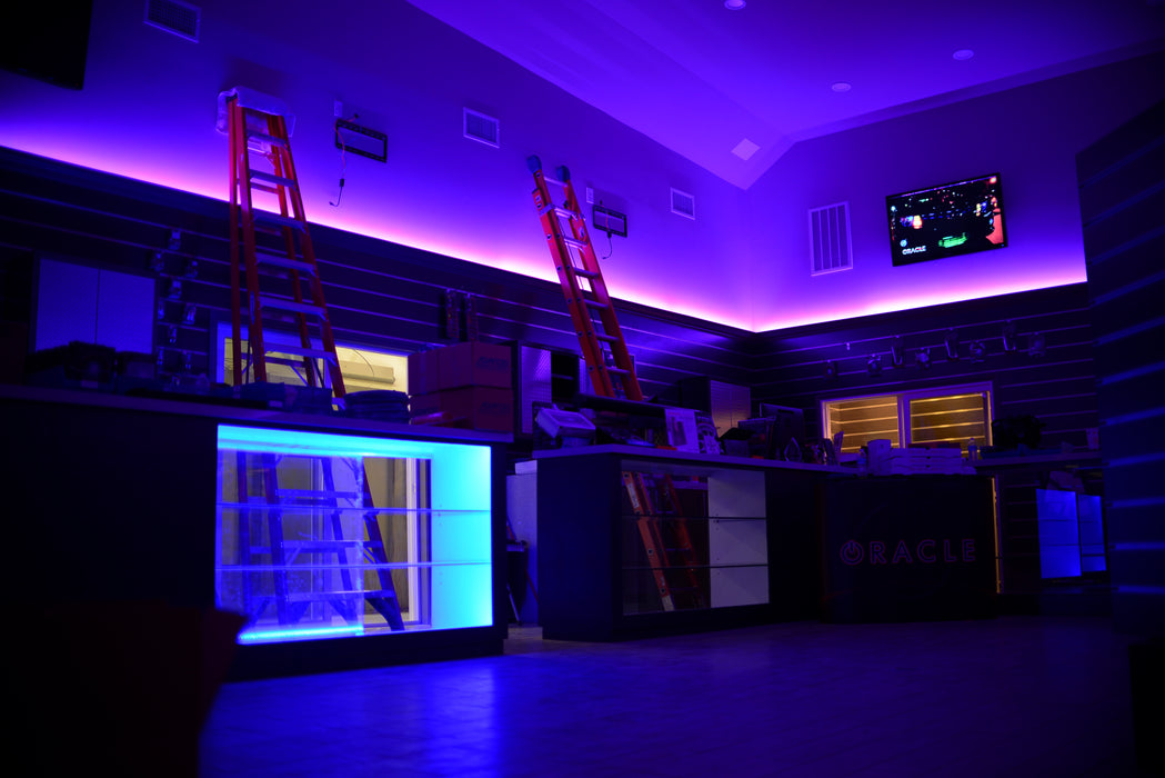 Showroom with purple LED lighting.