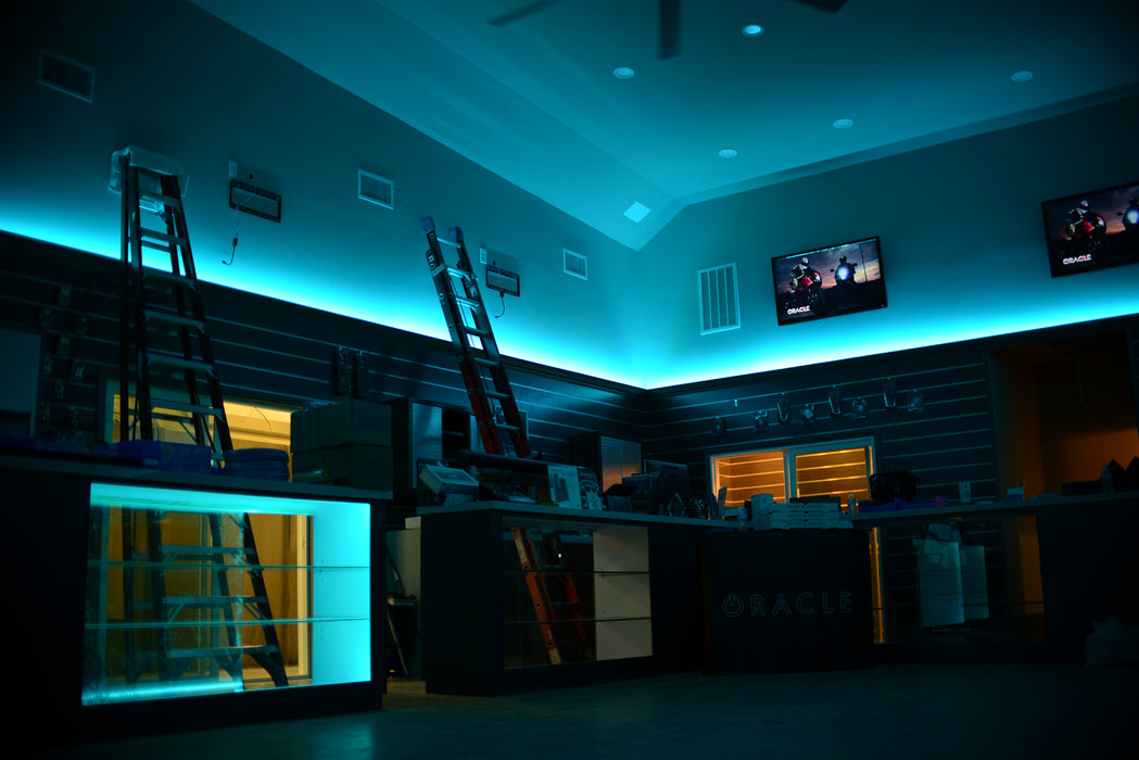 Showroom with cyan LED lighting.