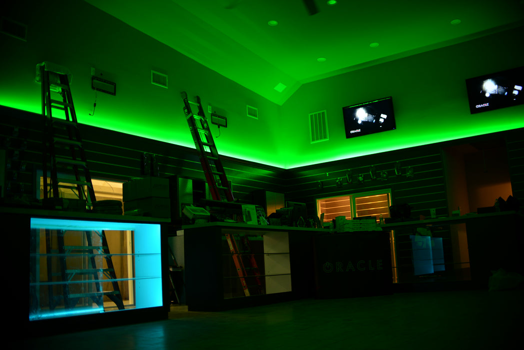 Showroom with green LED lighting.