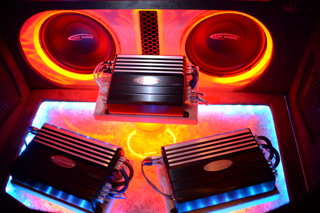 Speakers with red LED lighting accents.
