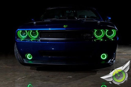 Front end of a Dodge Challenger with green LED headlight and fog light halo rings installed.
