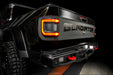 Rear end of a Jeep Gladiator with Flush Mount LED Tail Lights installed and brake lights on.