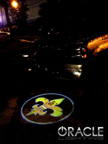 GOBO Projector installed on a car door, showing a Fleur de Lis.
