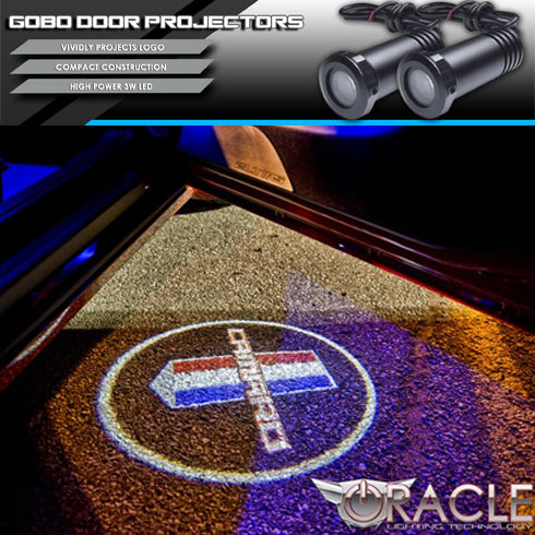 GOBO projector installed on a car door, showing the Camaro logo.