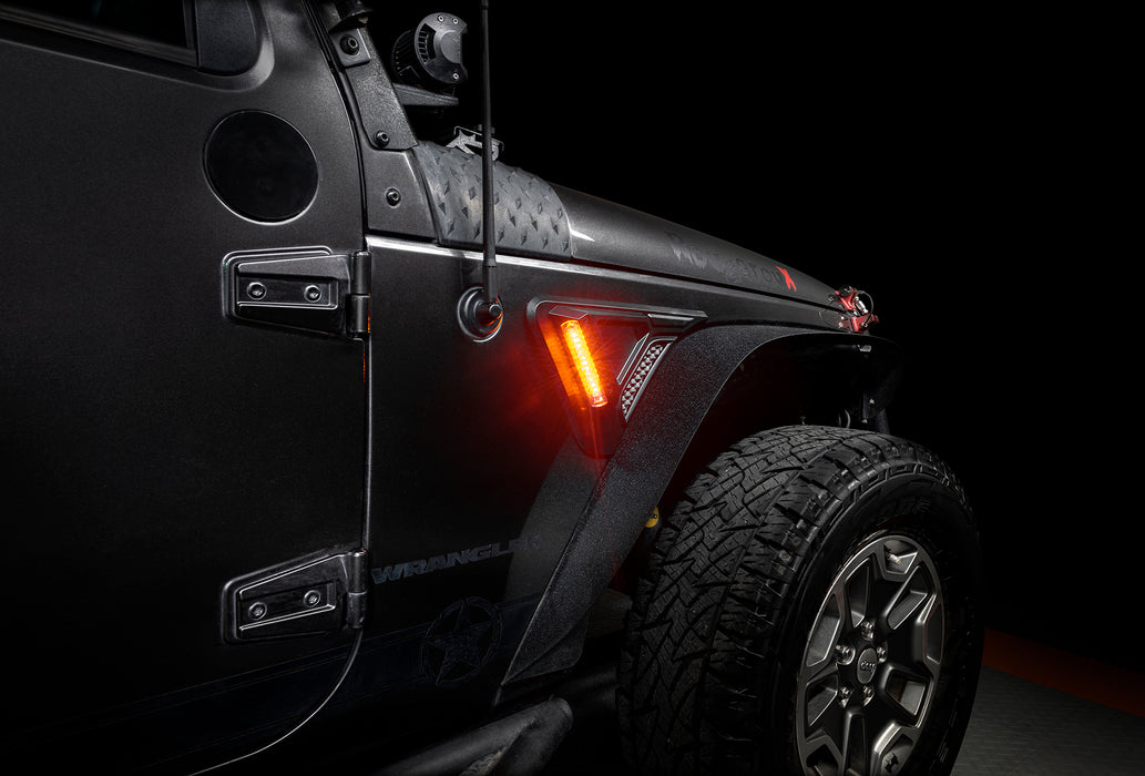 Close-up of Sidetrack™ LED Fender Lighting System installed on a Jeep Wrangler JK, set to amber LED mode.