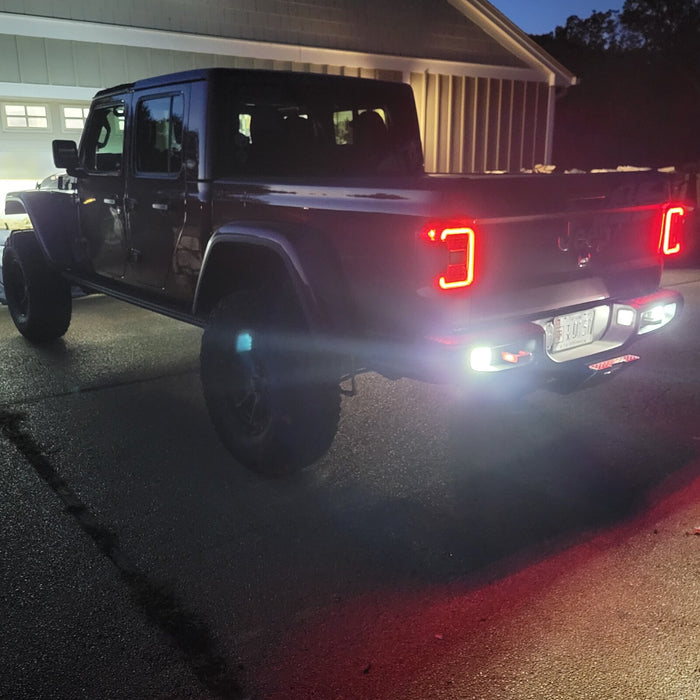 Rear three quarters view of a Jeep Gladiator with Rear Bumper LED Reverse Lights installed.