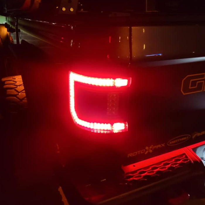 Close-up of a Flush Mount LED Tail Light installed on a Jeep Gladiator JT with brake lights on.