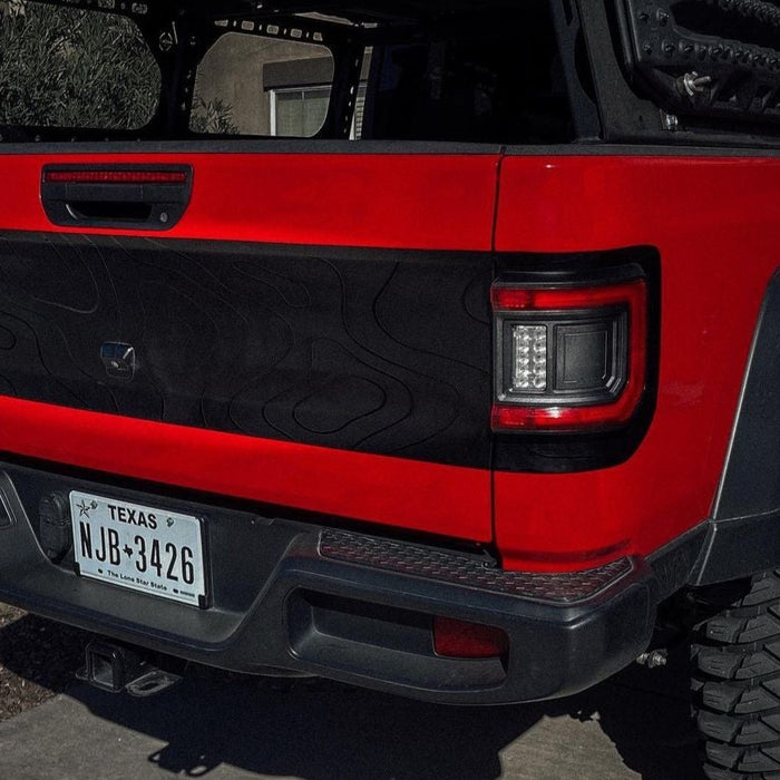 Rear end of a Jeep Gladiator with Flush Mount LED Tail Lights installed.