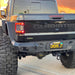 Rear view of a Jeep Gladiator with Flush Mount LED Tail Lights turned on.