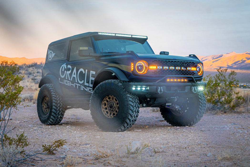 ORACLE Lighting wrapped bronco in the desert with multiple LED lighting products installed.