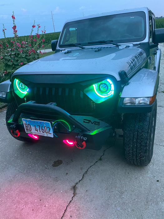 Front end of a Jeep with ColorSHIFT Oculus Headlights installed.