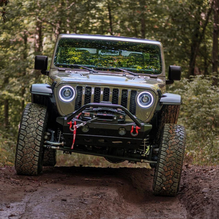 Trail-riding Jeep with Oculus Headlights installed and turned on.