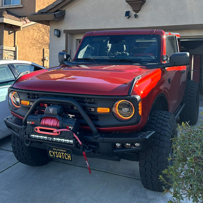 Red Ford Bronco with Oculus Headlights installed