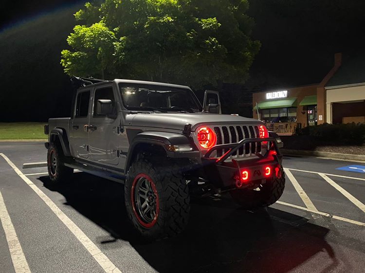 Three quarters view of a Jeep Gladiator JT, with ColorSHIFT Oculus Headlights installed.