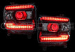 GMC Sierra headlights with red DRLs.