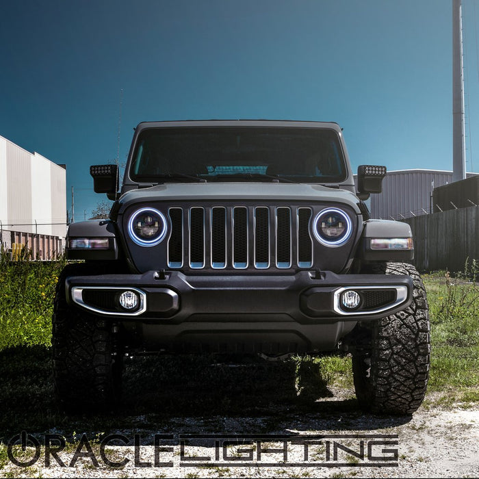 Front view of a Jeep Wrangler with 7" High Powered LED Headlights installed, and white halos on.