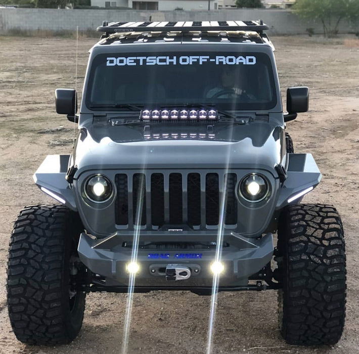 Front view of Oculus Headlights installed on a Jeep.