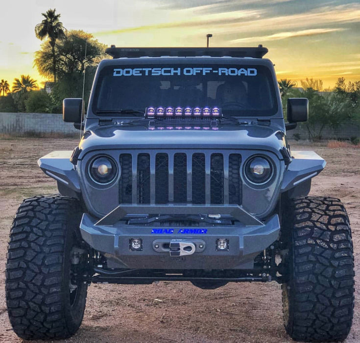 Front end of a Jeep Wrangler with Oculus Headlights installed.