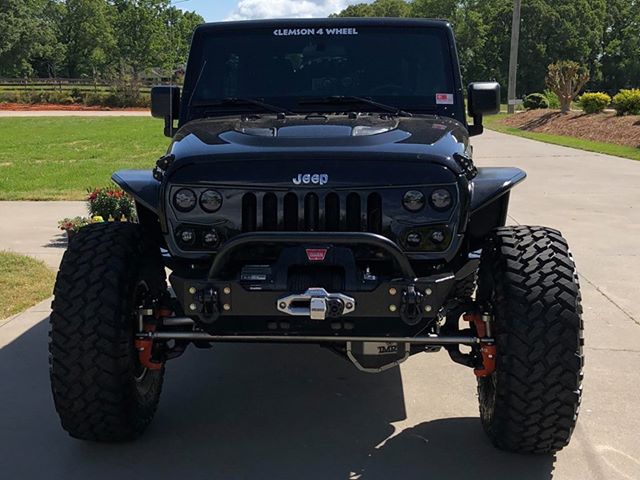 Front end of a Jeep Wrangler JK with Vector Pro-Series Grill installed.