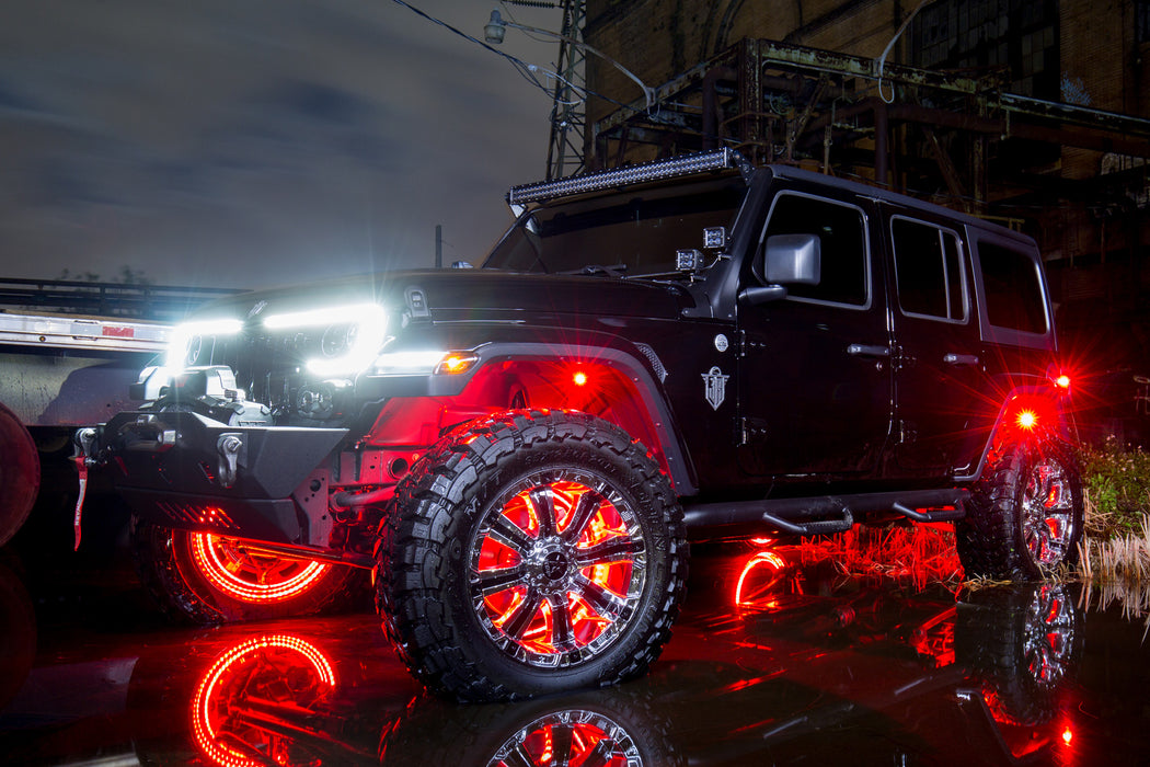 Three quarters view of a black Jeep Wrangler JL with VECTOR Pro-Series LED Grill installed.