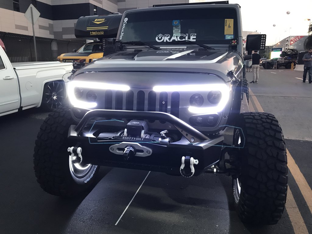 a Jeep like vehicle with custom header lights