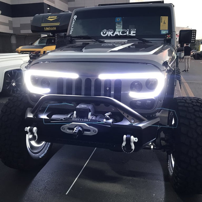 a Jeep like vehicle with custom header lights