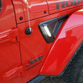 Close-up of Sidetrack™ LED Lighting System installed on a Jeep, with white LEDs on.