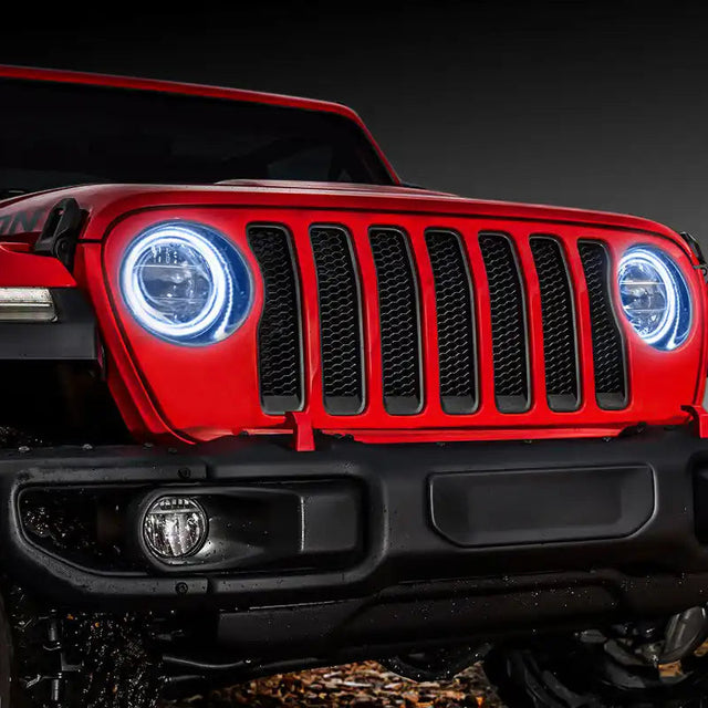 Front end of a red Jeep with white LED Surface Mount Headlight Halos.