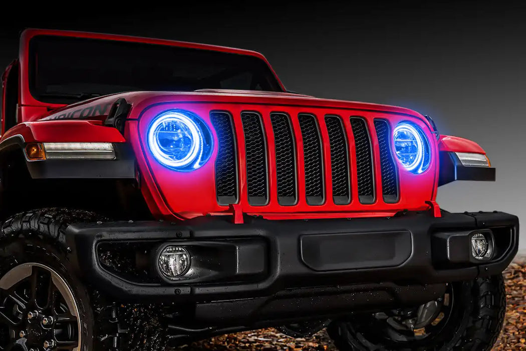 Front end of a red Jeep with blue LED Surface Mount Headlight Halos.