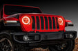 Front end of a red Jeep Wrangler JL with amber headlight DRLs on.