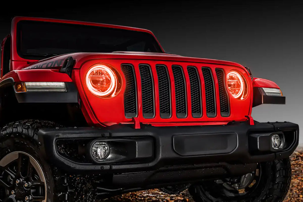 Front end of a red Jeep with amber LED Surface Mount Headlight Halos.