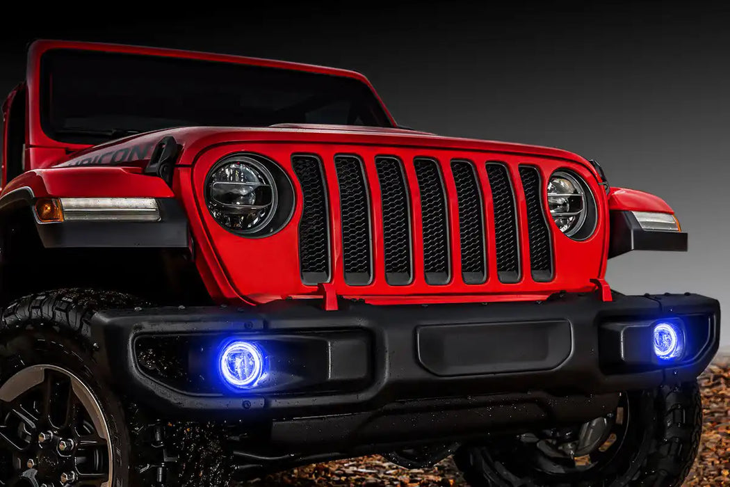 Front end of a red Jeep with blue LED Surface Mount Fog Light Halos.