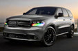 Three quarters view of a Dodge Durango with rainbow headlight DRLs.
