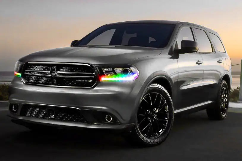 Three quarters view of a Dodge Durango with rainbow headlight DRLs.