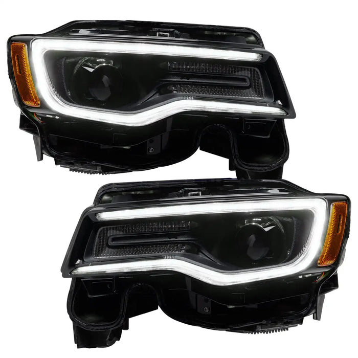 Jeep Grand Cherokee headlights with white DRLs.