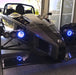Ariel Atom with blue headlight halos.