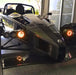 Ariel Atom with amber headlight halos.