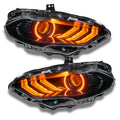 Ford Mustang headlights with amber halos and DRLs.
