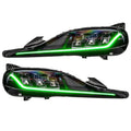 Toyota Supra headlights with green DRLs.