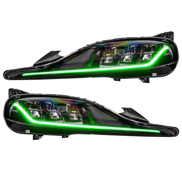 Toyota Supra headlights with green DRLs.