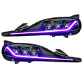 Toyota Supra headlights with purple DRLs.