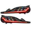 Toyota Supra headlights with red DRLs.