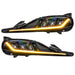 Toyota Supra headlights with yellow DRLs.