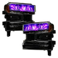 Chevrolet Silverado 1500 headlights with purple demon eye projectors.