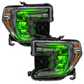 GMC Sierra 1500 headlights with green demon eye projectors.