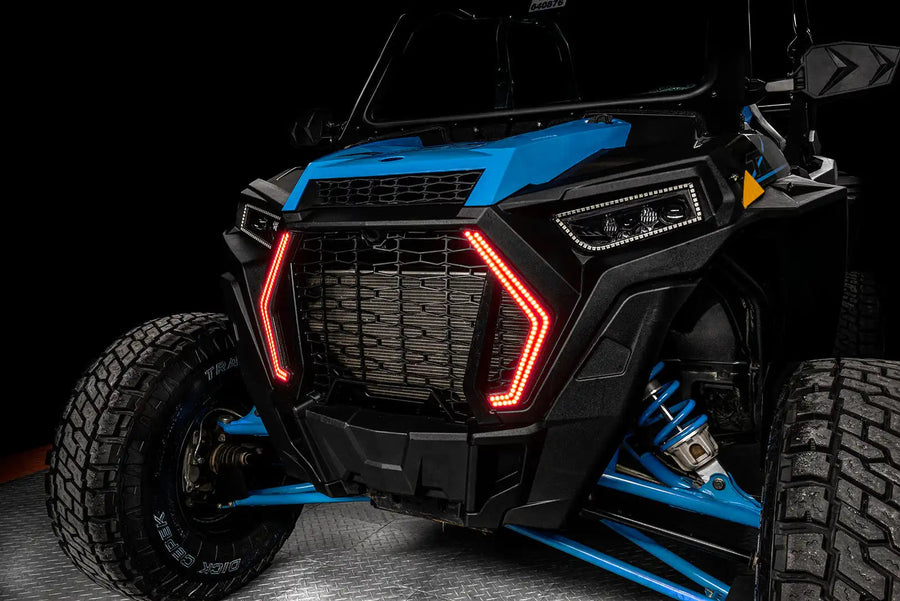 Angled view of Polaris RZR with red DRLs