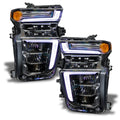 Chevrolet Silverado headlights with white DRLs.